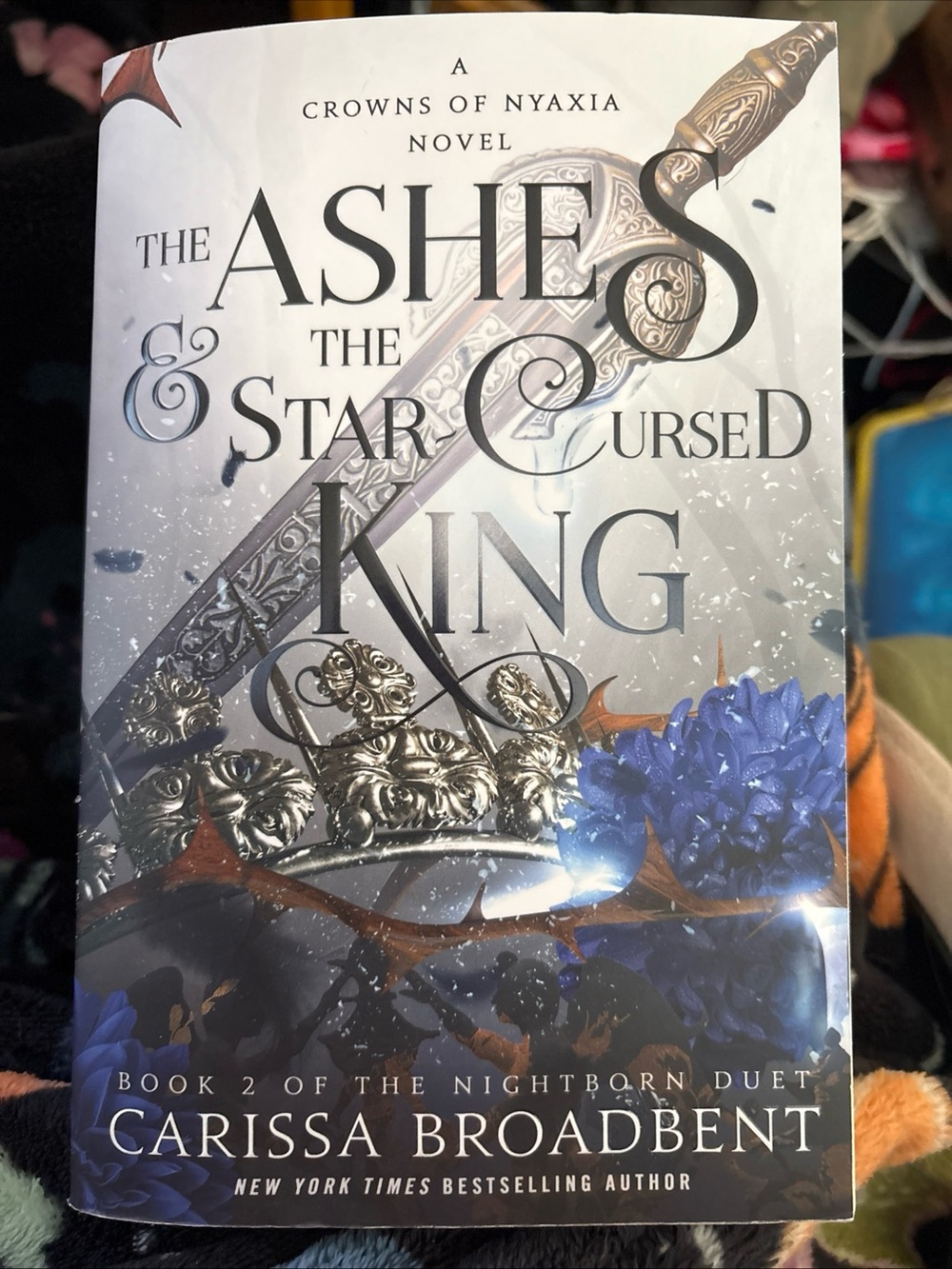 The Ashes & The Star Cursed King by Carissa Broadbent - Blue Cover